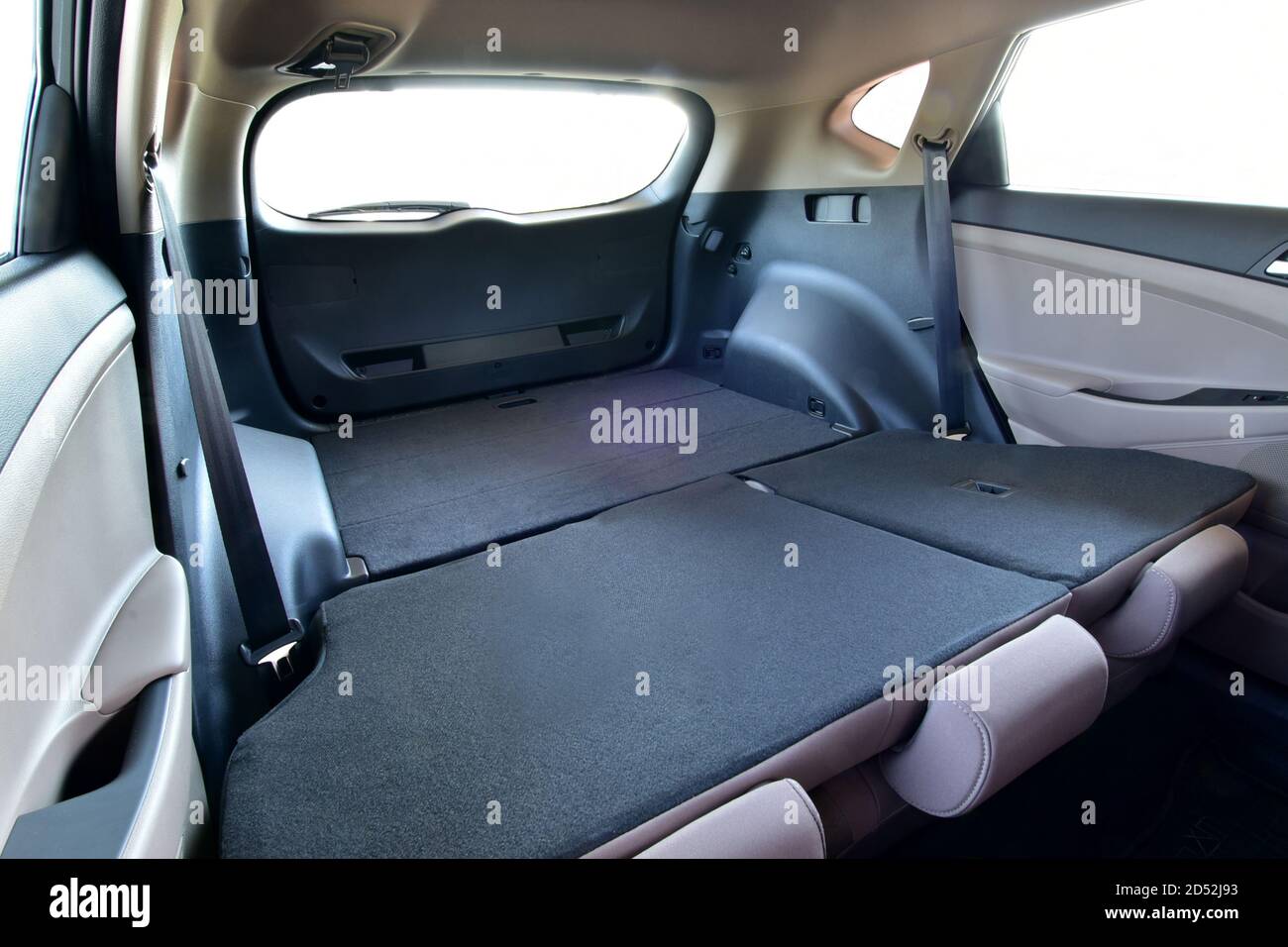 Trunk of car with rear seats folded, inside view Stock Photo Alamy