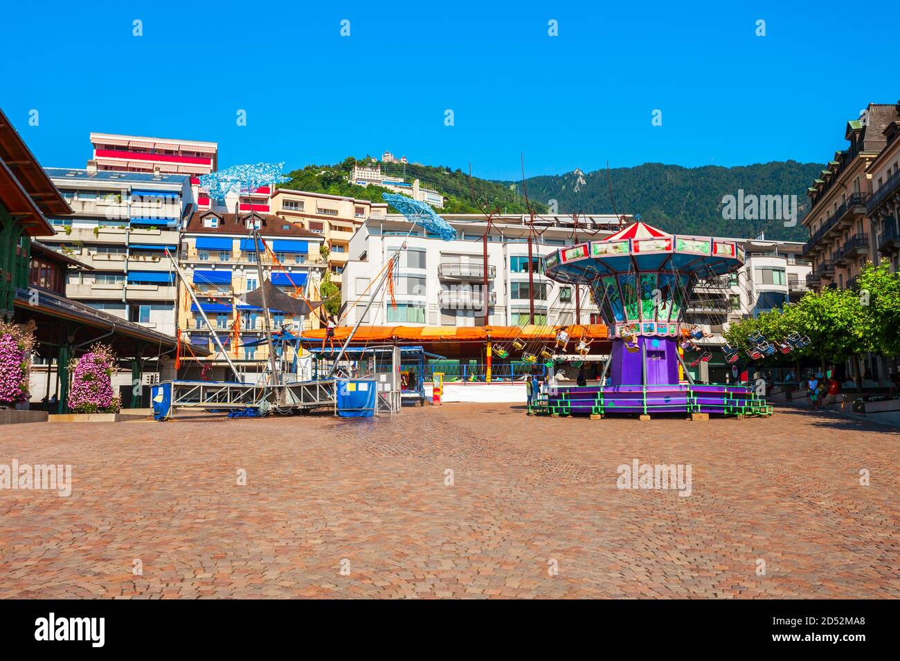 MONTREAUX, SWITZERLAND - JULY 19, 2019: Carousel in the centre of Montreaux. Montreux is a town on the shoreline of Lake Geneva at the foot of the Alp Stock Photo