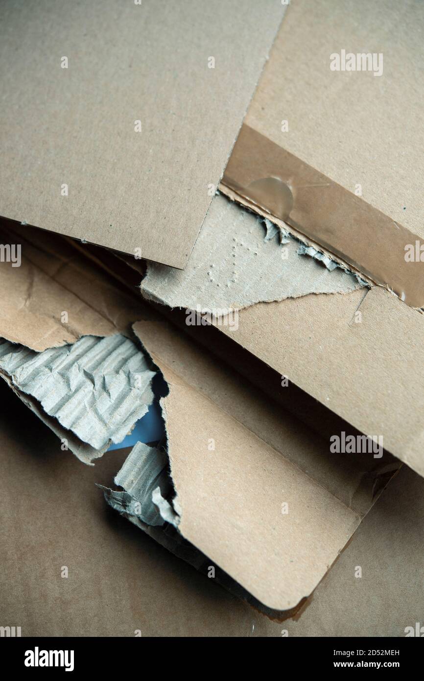 Ripped and damaged pieces of a cardboard box Stock Photo Alamy