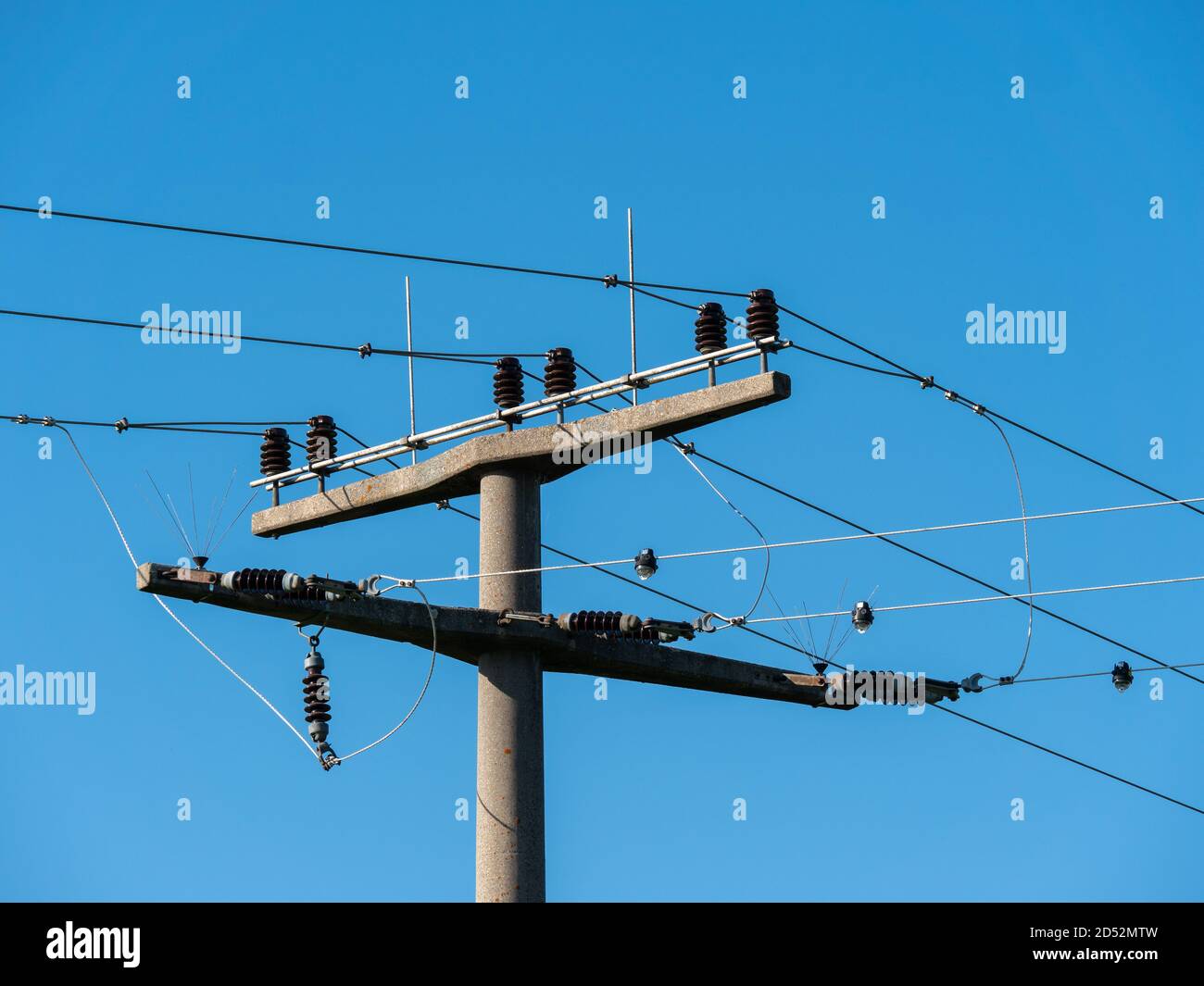 Close up on high voltage transmission pylon Stock Photo
