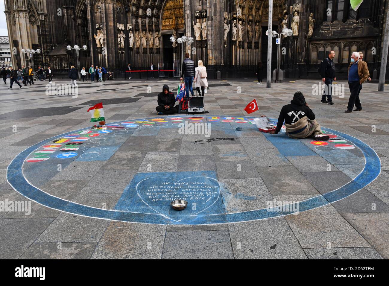 Cologne, Germany, 2020. Street artists trying to make a living around the Cathedral Stock Photo