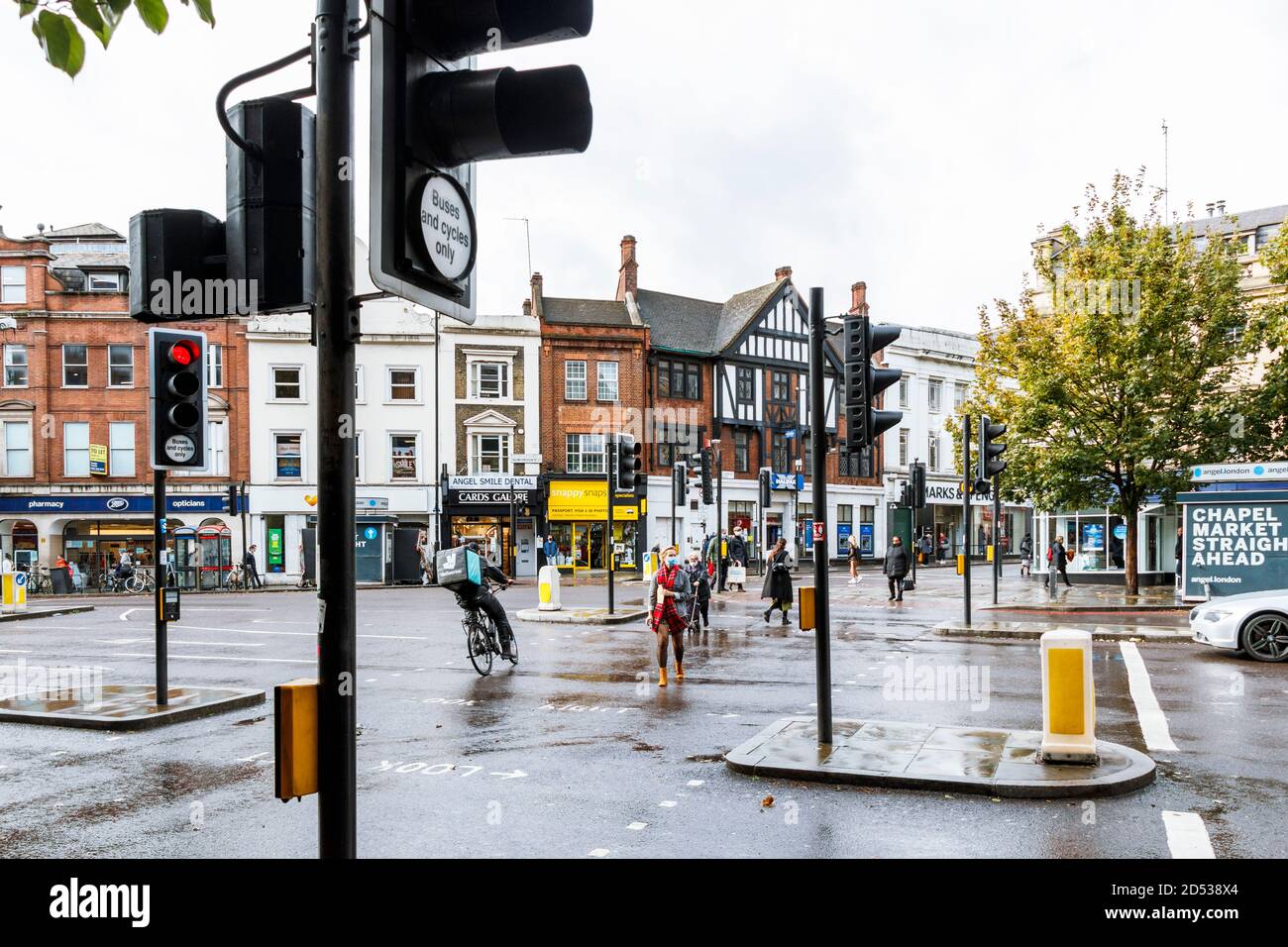 Islington High Street at The Angel on a rainy October weekday, London, UK Stock Photo