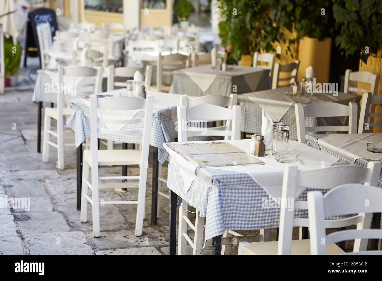 Taverna at plaka Athens Greece, tables and chairs Stock Photo