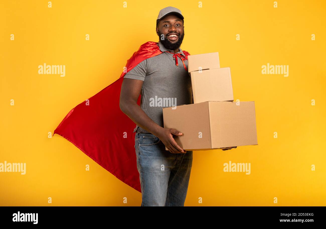 Courier acts like a powerful superhero. Concept of success and guarantee on shipment Stock Photo