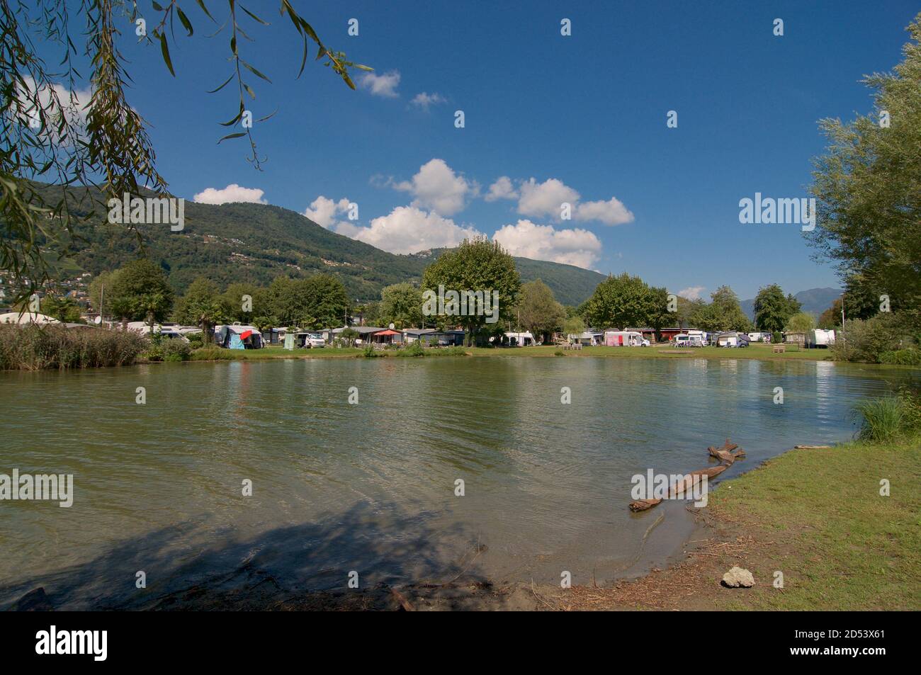 View on the gulf of a Agno and a camping site located in the Ticino Canton, Switzerland Stock Photo