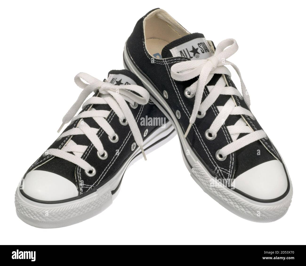 Pair of converse all star shoes photographed on a white background Stock  Photo - Alamy