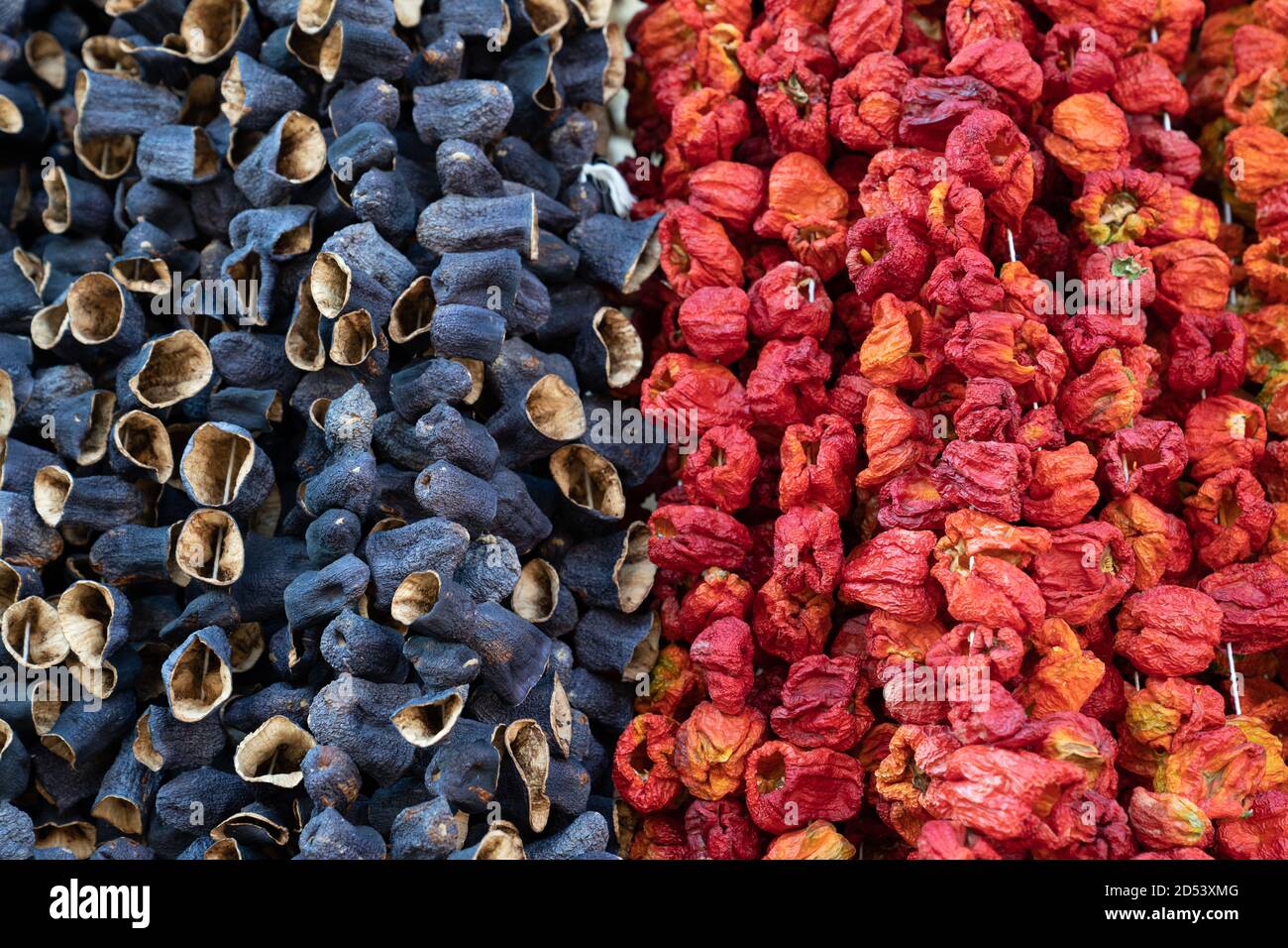 Dried peppers and eggplant hanging in a market Stock Photo - Alamy