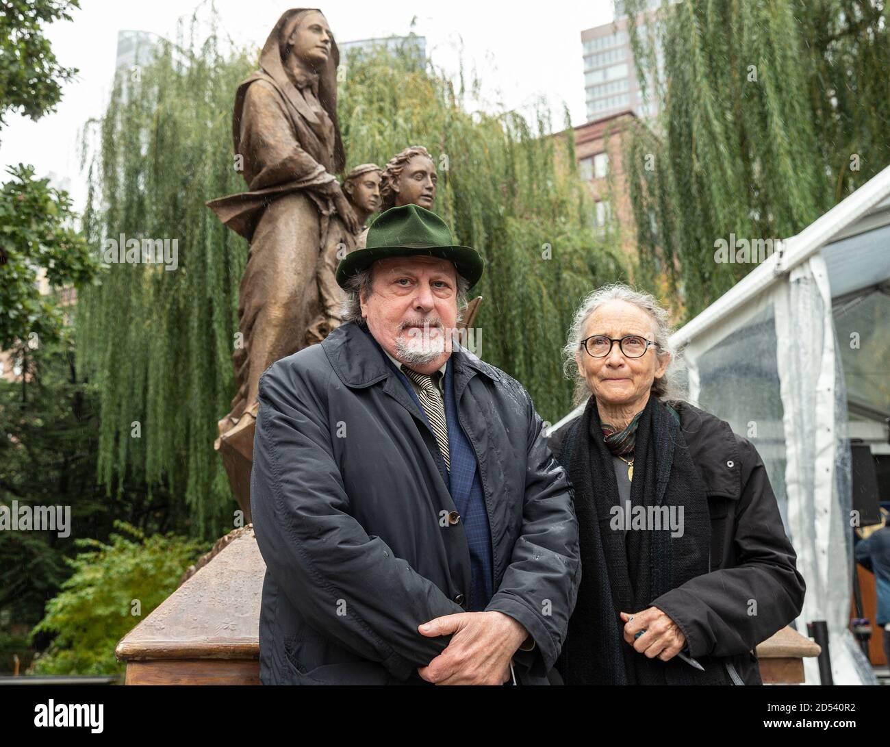 New York, United States. 12th Oct, 2020. Artists Giancarlo Biagi and Jill Biagi pose during unveiling of Mother Cabrini Memorial in Battery Park. During pandemic when Columbus Day parade has been canceled memorial and sculpture for Mother Cabrini has been unveiled. Mother Cabrini born Maria Francesca Cabrini was the first U.S. citizen to be canonized as a Saint by the Roman Catholic Church. (Photo by Lev Radin/Pacific Press) Credit: Pacific Press Media Production Corp./Alamy Live News Stock Photo