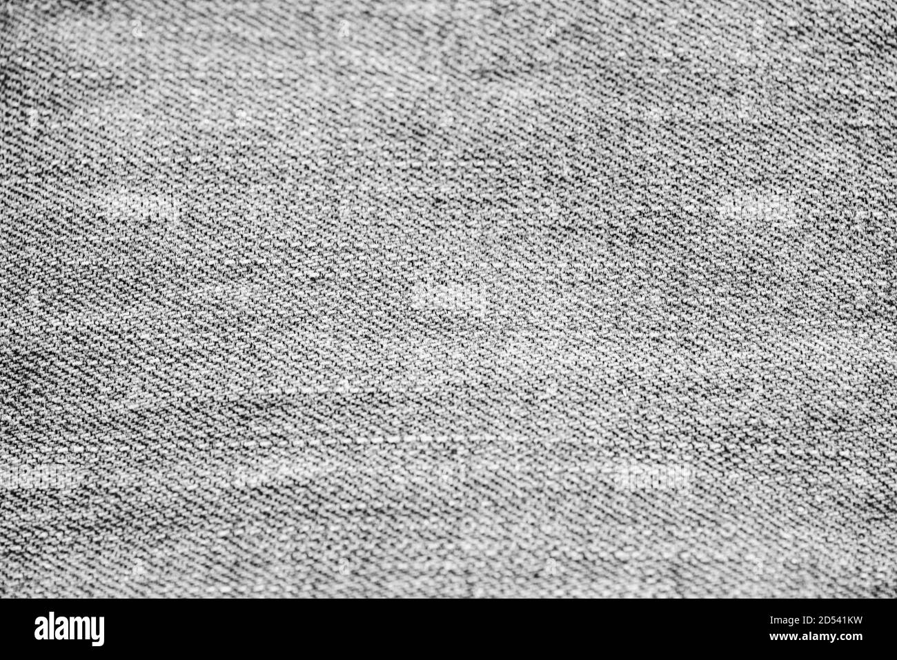 black Denim fabric texture. Black jeans denim cloth fragment as a  background texture composition Stock Photo - Alamy