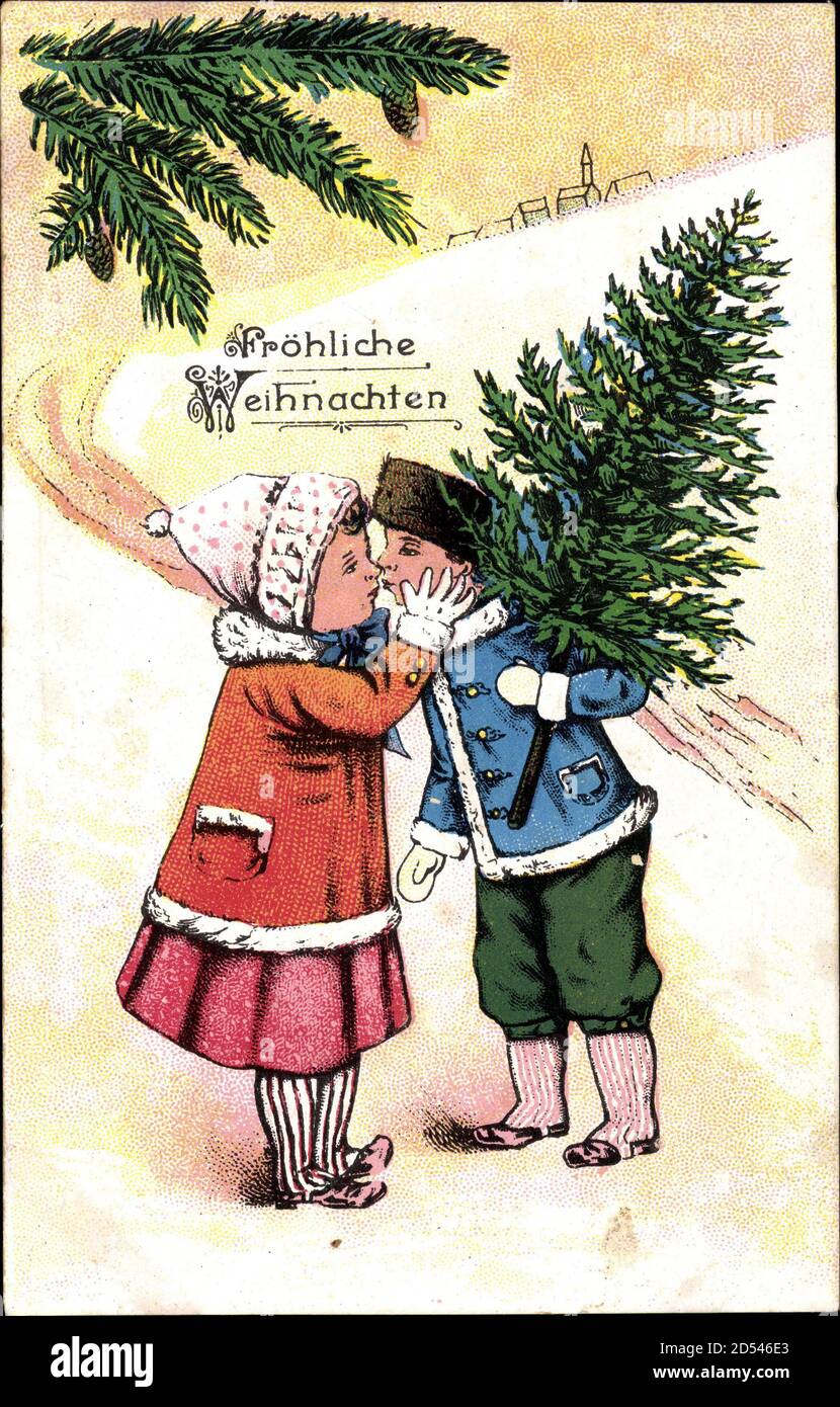 Glückwunsch Weihnachten, Mädchen küsst einen Jungen, Tannenbaum | usage worldwide Stock Photo