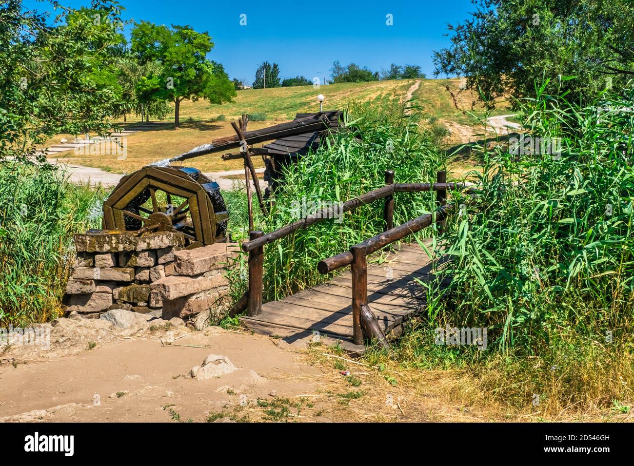 Zaporozhye, Ukraine 07.21.2020. Water Mill in Voznesenovsky park in Zaporozhye, Ukraine, on a sunny summer morning Stock Photo