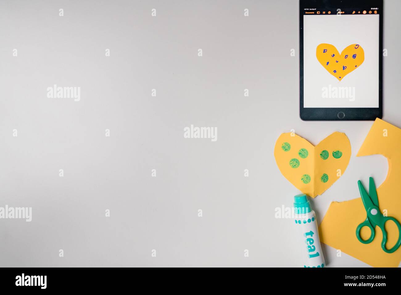 tablet distance learning flat lay with school supplies Stock Photo