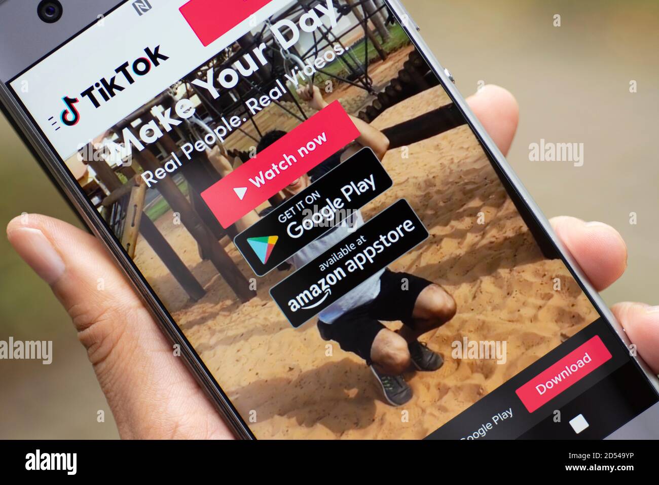 TikTok Tik Tok, Douyin Login Screen Mobile Phone, Download App from Google Play or Amazon Appstore Stock Photo