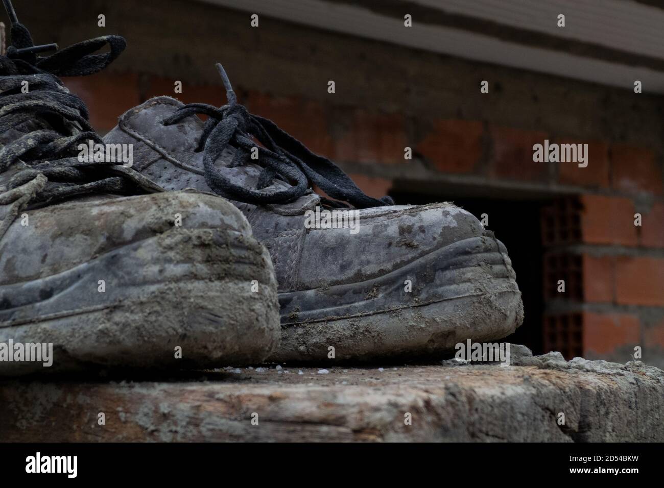 a pair of dirty working boots Stock Photo