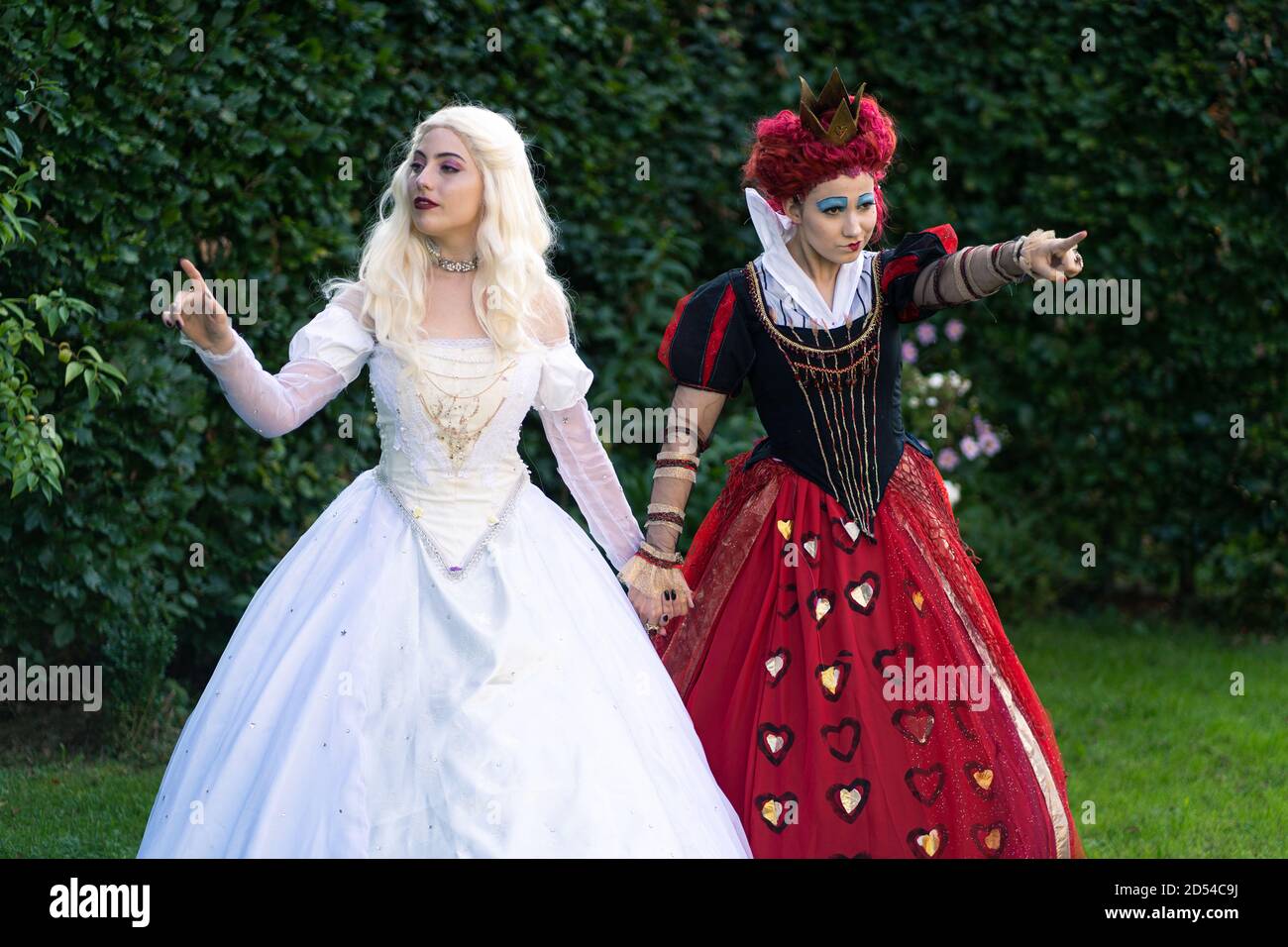 MUNICH, GERMANY - Sep 12, 2020: Cosplayer as characters from Alice in  Wonderland. The red queen and white queen together Stock Photo - Alamy