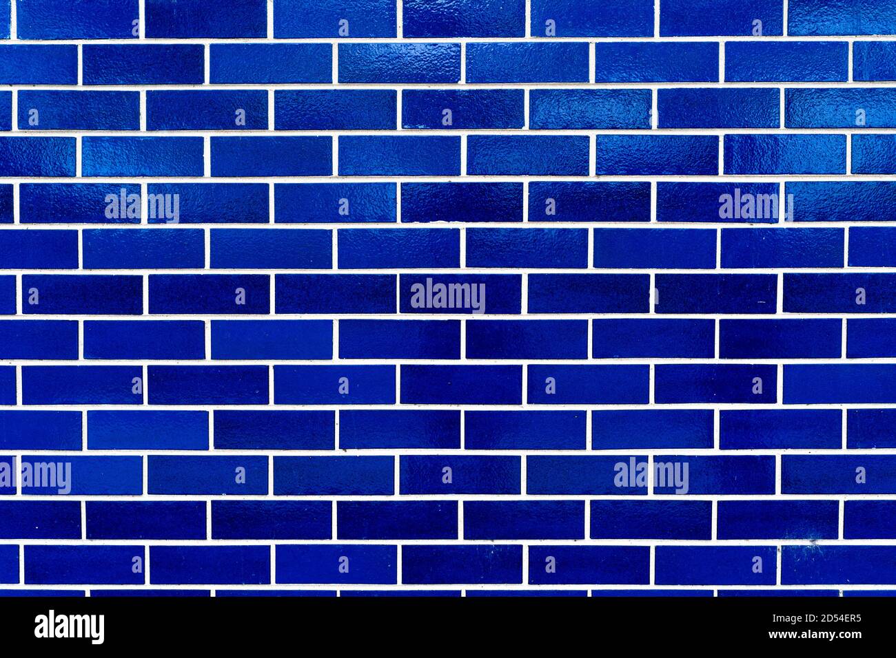bright blue brick wall, good pattern or background Stock Photo Alamy