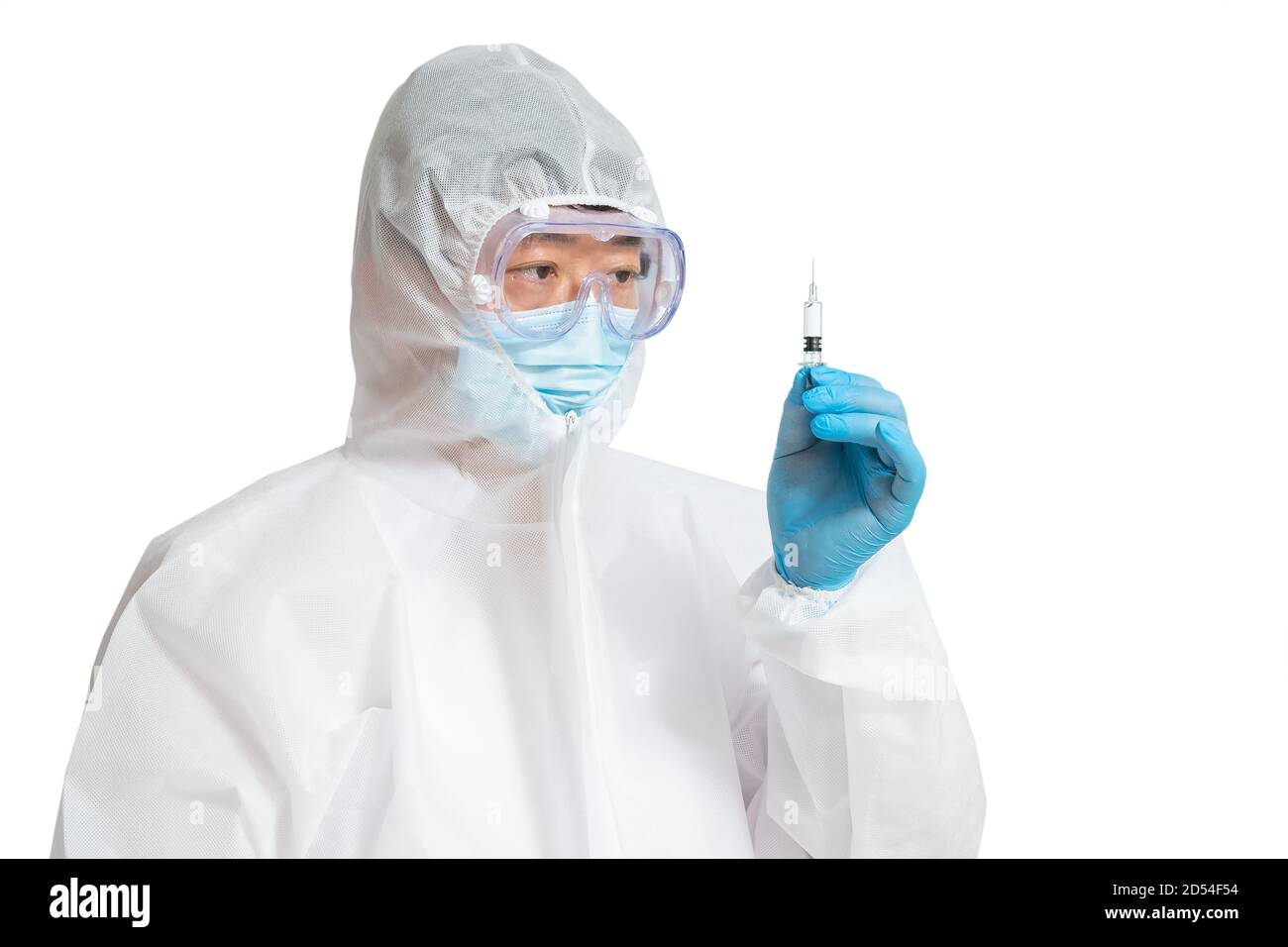 An Asian man wearing a protective suit, protective face masks, and safety glasses on a white background. Stock Photo