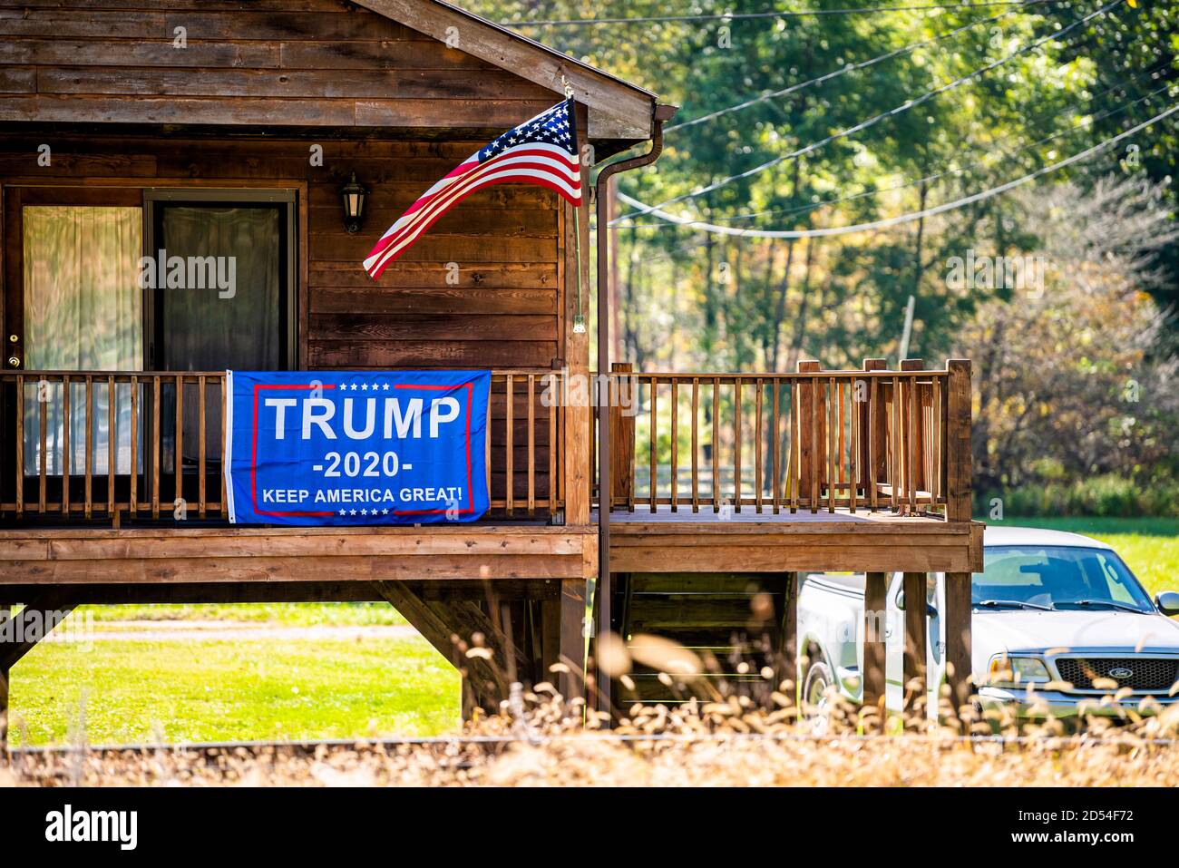 Bartow, USA - October 6, 2020: Town in West Virginia countryside and sign on house building for Trump political election banner in Durbin Frank area Stock Photo