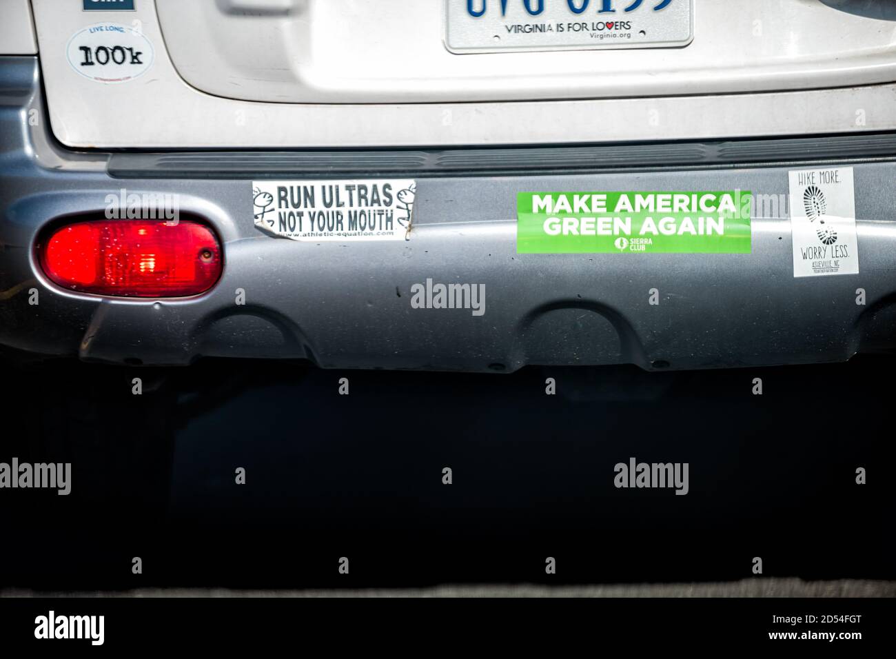 Reston, USA - August 30, 2020: Run ultras not your mouth and make America green again bumper stickers from Sierra Club on car Stock Photo