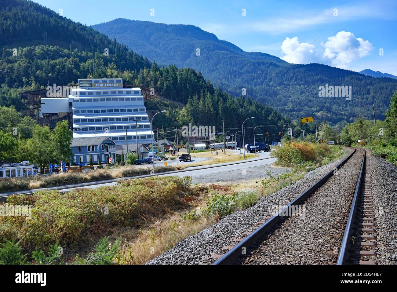 British Columbia, Canada - July 22, 2015:  A mining museum located at the foot of a mountain on the Sea to Sky Highway allows visitors to travel on a Stock Photo