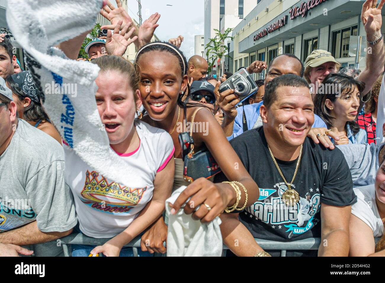 Miami Florida,Flagler Street,Marlins Major League Baseball team World Series winner,fans celebrate celebrating parade,Black African Hispanic girl girl Stock Photo