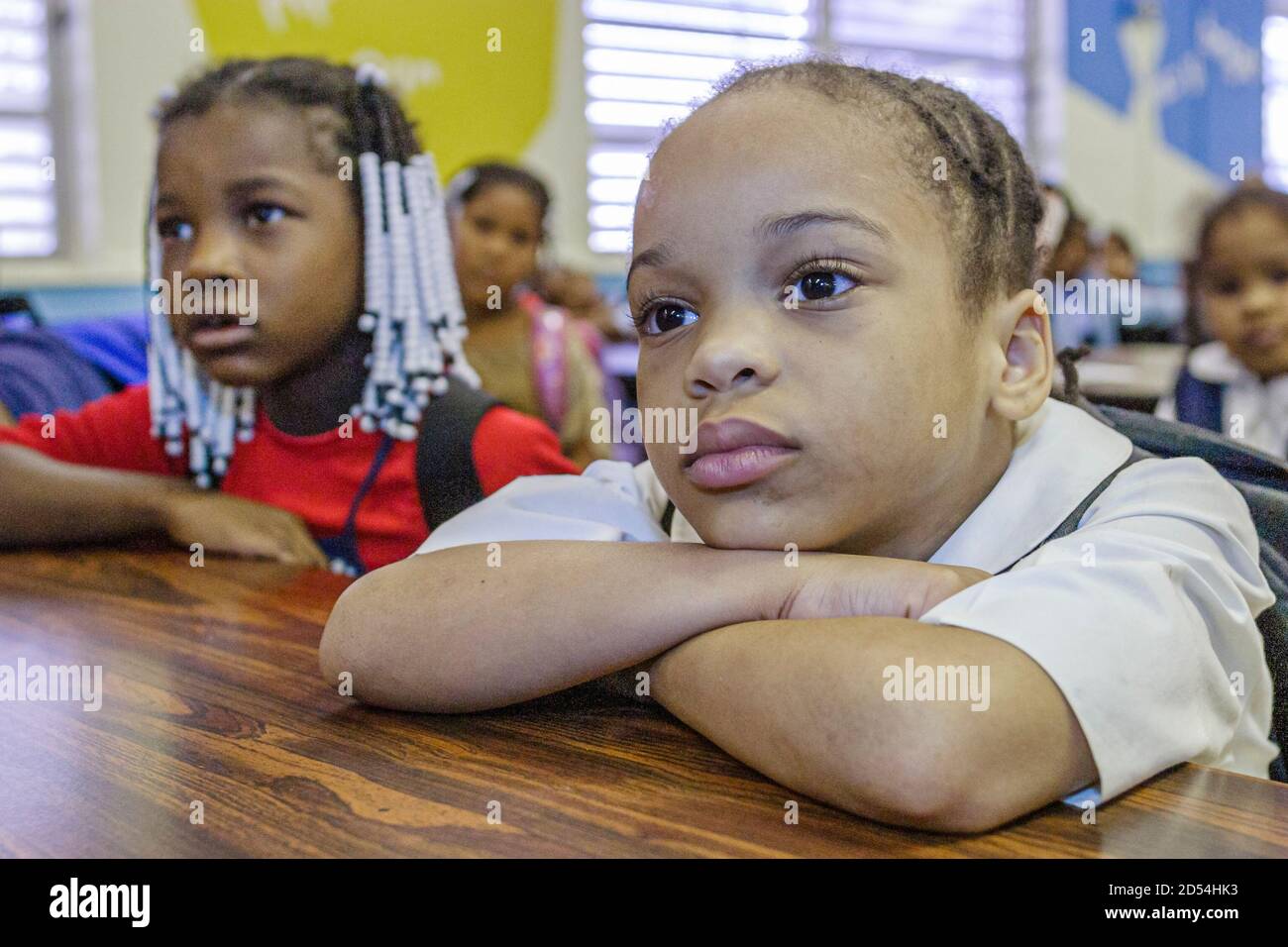 Miami Florida,Little Haiti,Little River Elementary School Red Ribbon Week,anti drug program assembly Black students girls listen listening, Stock Photo