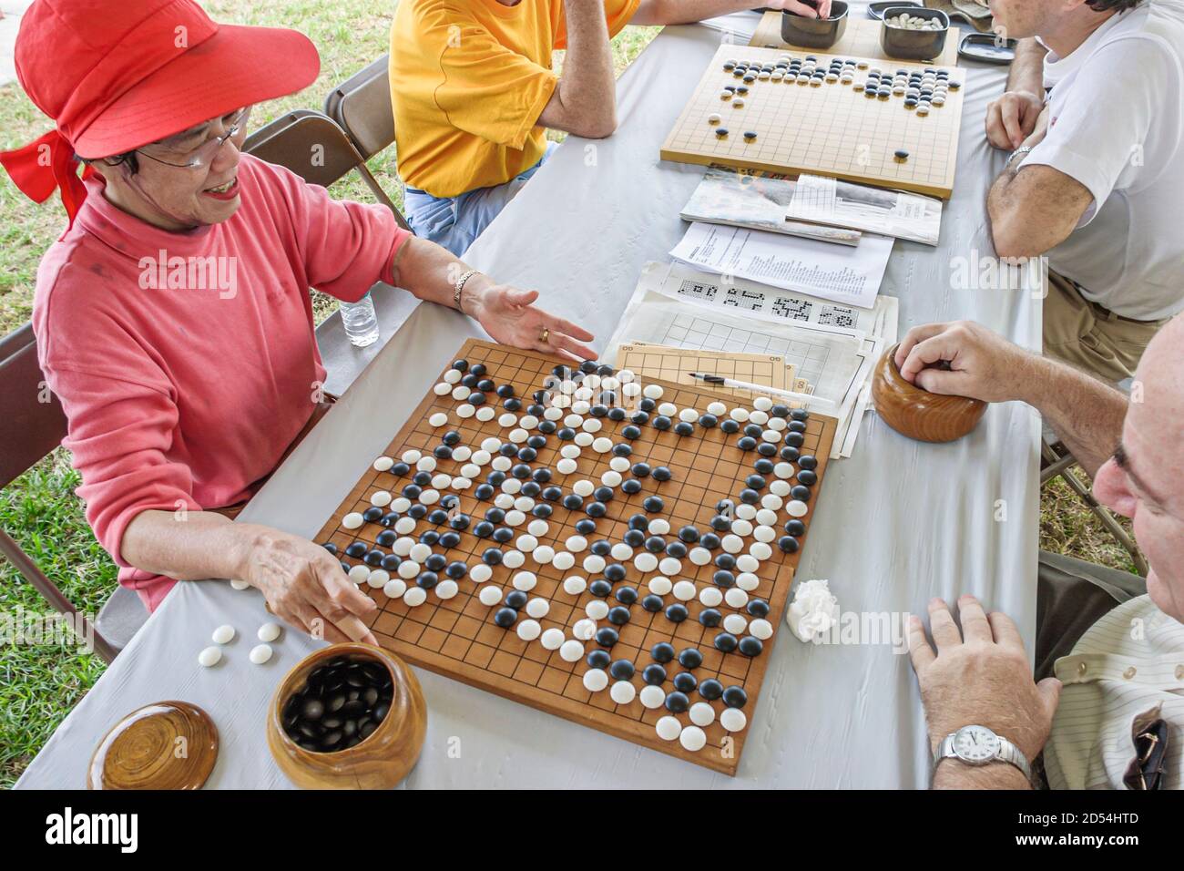 Florida Miami Bayfront Park Japanese Festival, Asian Japanese woman playing board game Go Stock