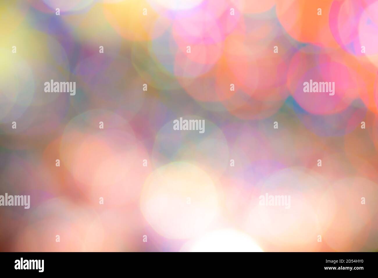 colored blurry round spots of warm shades for pale red background Stock Photo