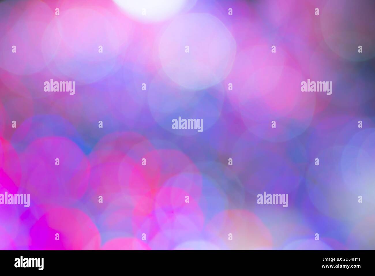colored blurry round spots of cool shades for pale mauve background Stock Photo