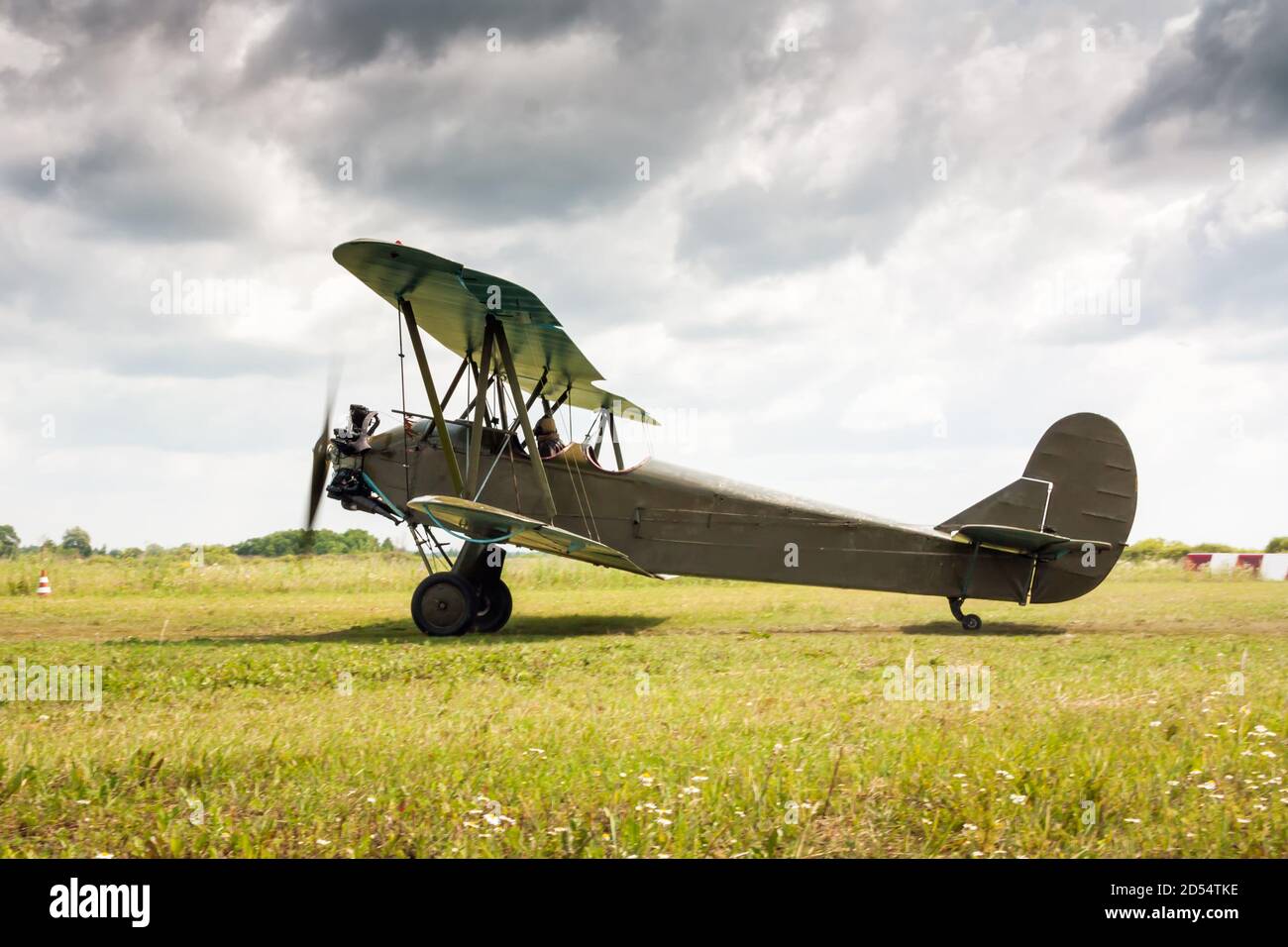 Retro airplane is preparing to take off Stock Photo - Alamy