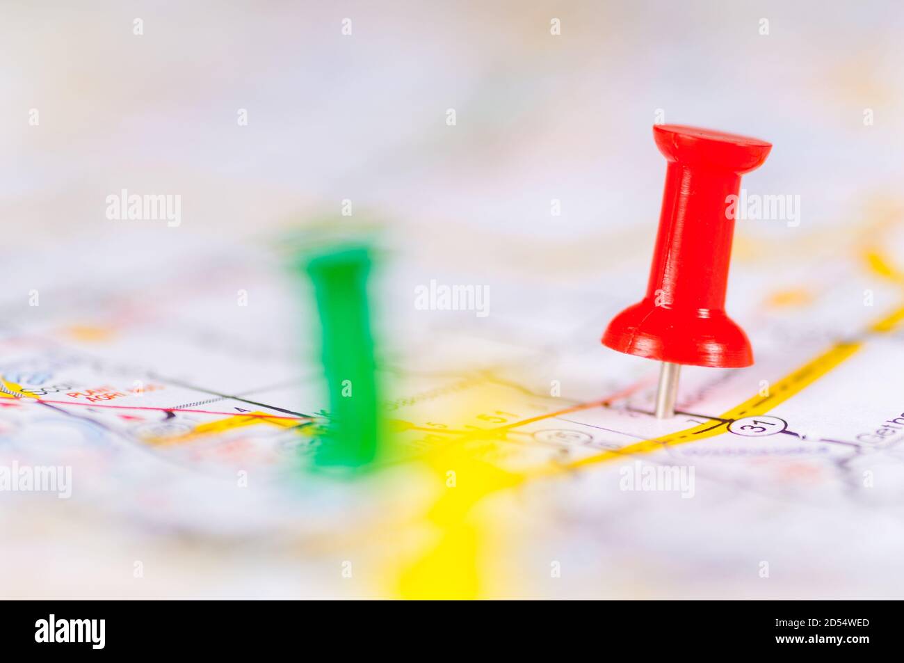 Colorful push pins on a map Stock Photo