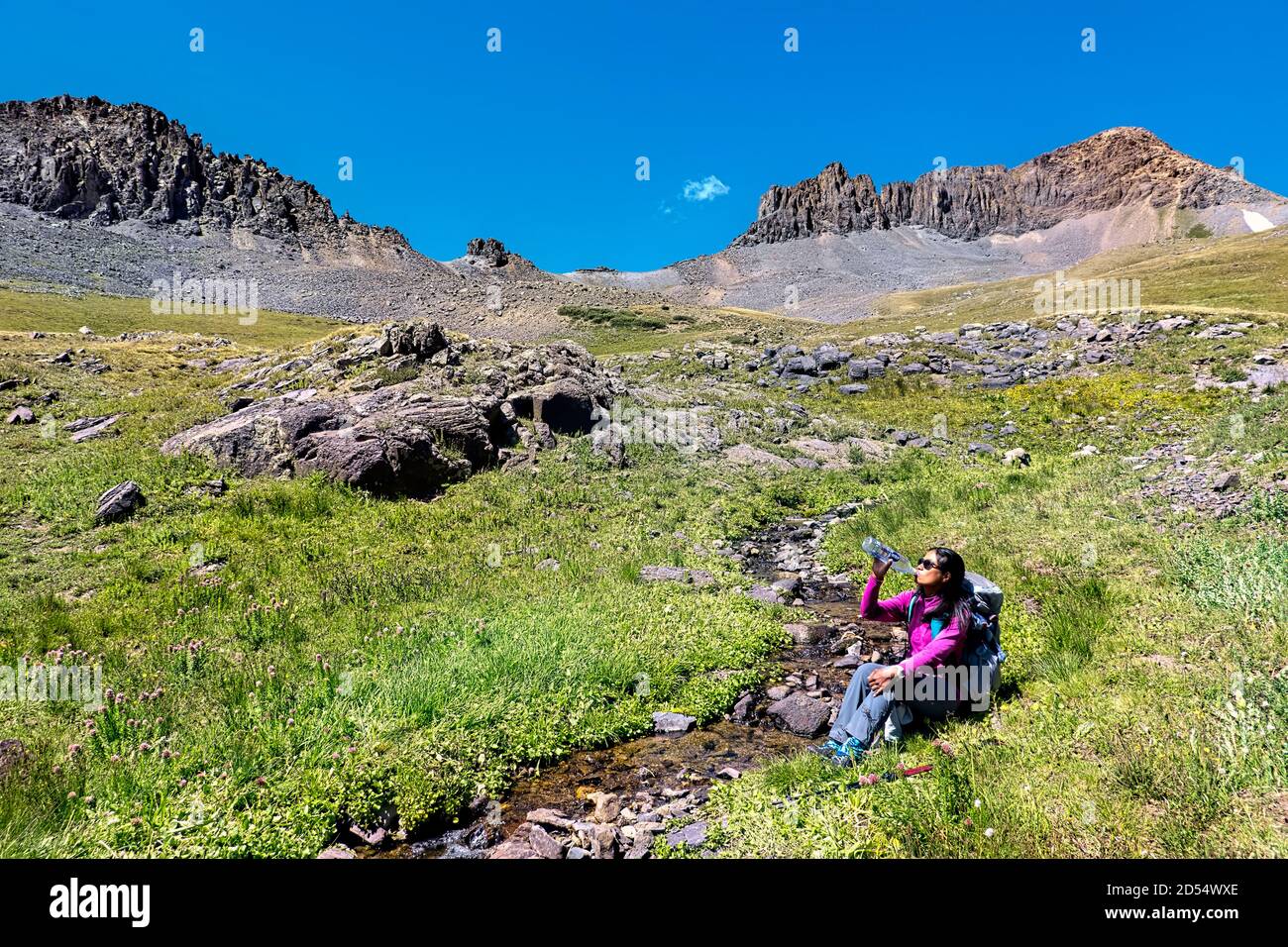 Drinking from the source of the Rio Grande, San Juan Mountains, Colorado Trail, Colorado Stock Photo