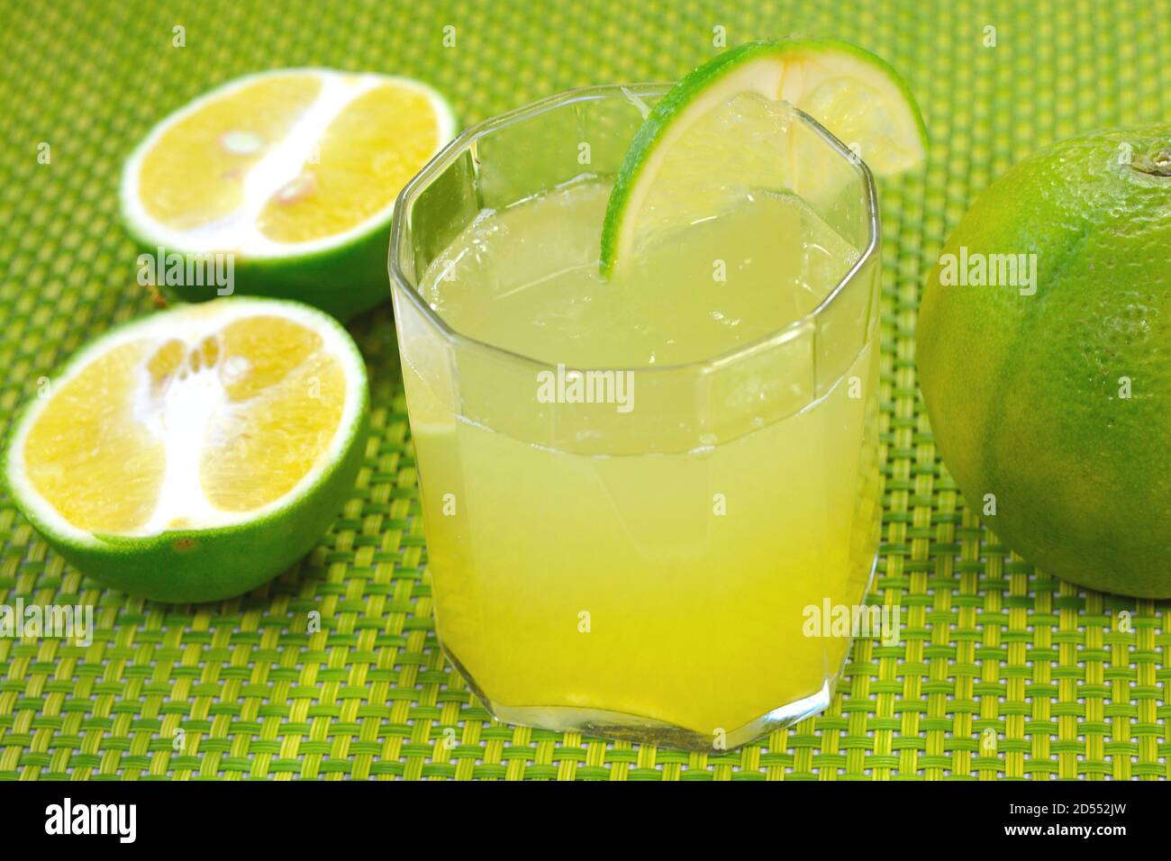 Sweet lime juice is a popular juice in asian countries. Sweet lime also called as Mosambi in India is part of the citric family Stock Photo