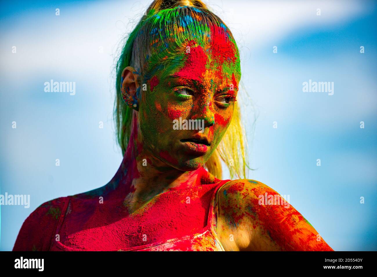 Color face with colorful holi splash Stock Photo Alamy