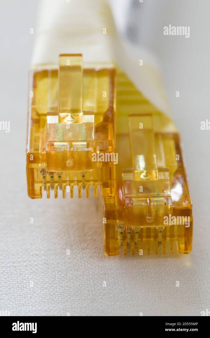 Yellow LAN cable plugs for communication Stock Photo Alamy