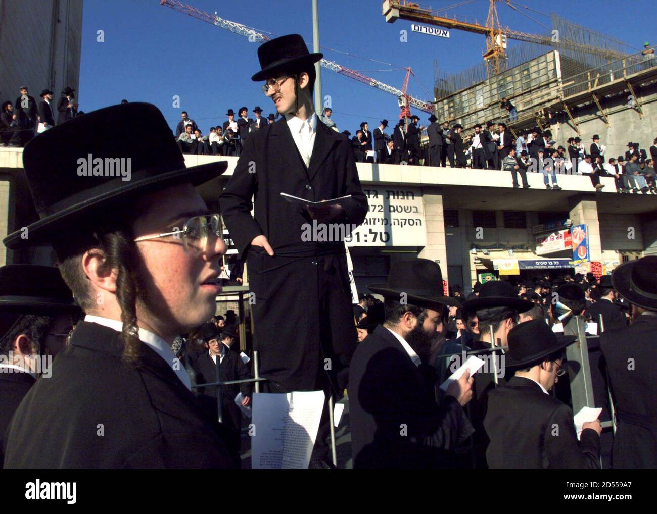 Ultra-orthodox Jews pack the roofs of 