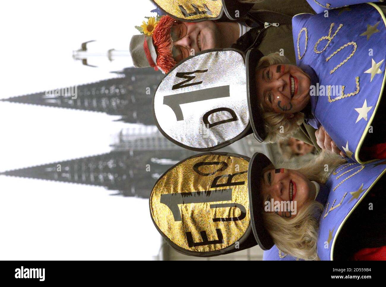 Carnev Goers Dress As Euro And Deutschmark Coins During The Traditional Rosemonday Carnival Parade In Cologne February 15 The Rosemonday Parades In Cologne Mainz And Duesseldorf Are The Highlight Of The German
