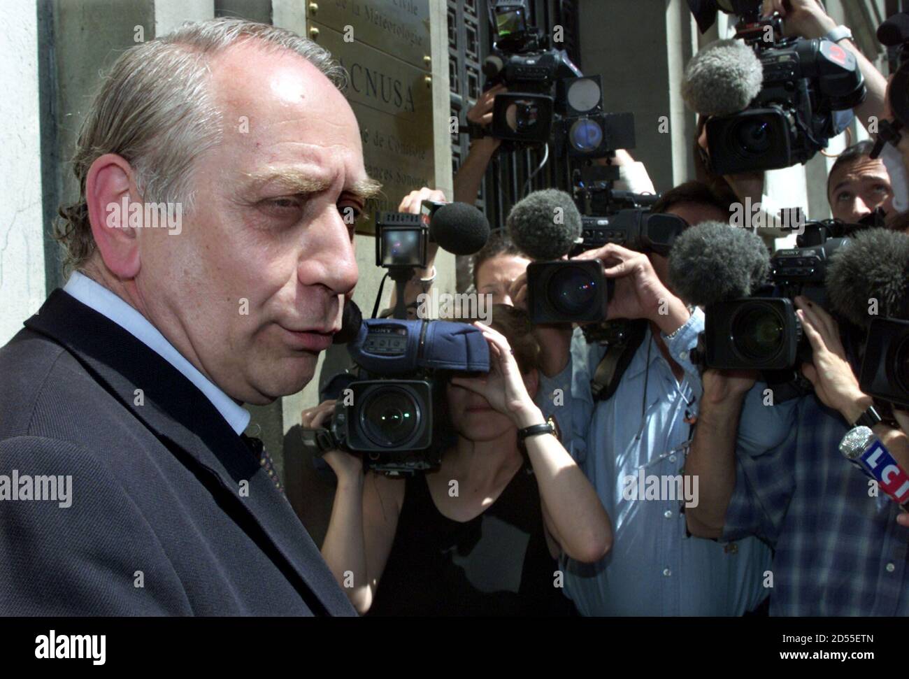 French head of the Accident Investigation Bureau (BEA) Paul Louis Arslanian  talks to reporters as he arrives at the civil aviation authority  headquarter in Paris July 31. Investigators meet to refin their