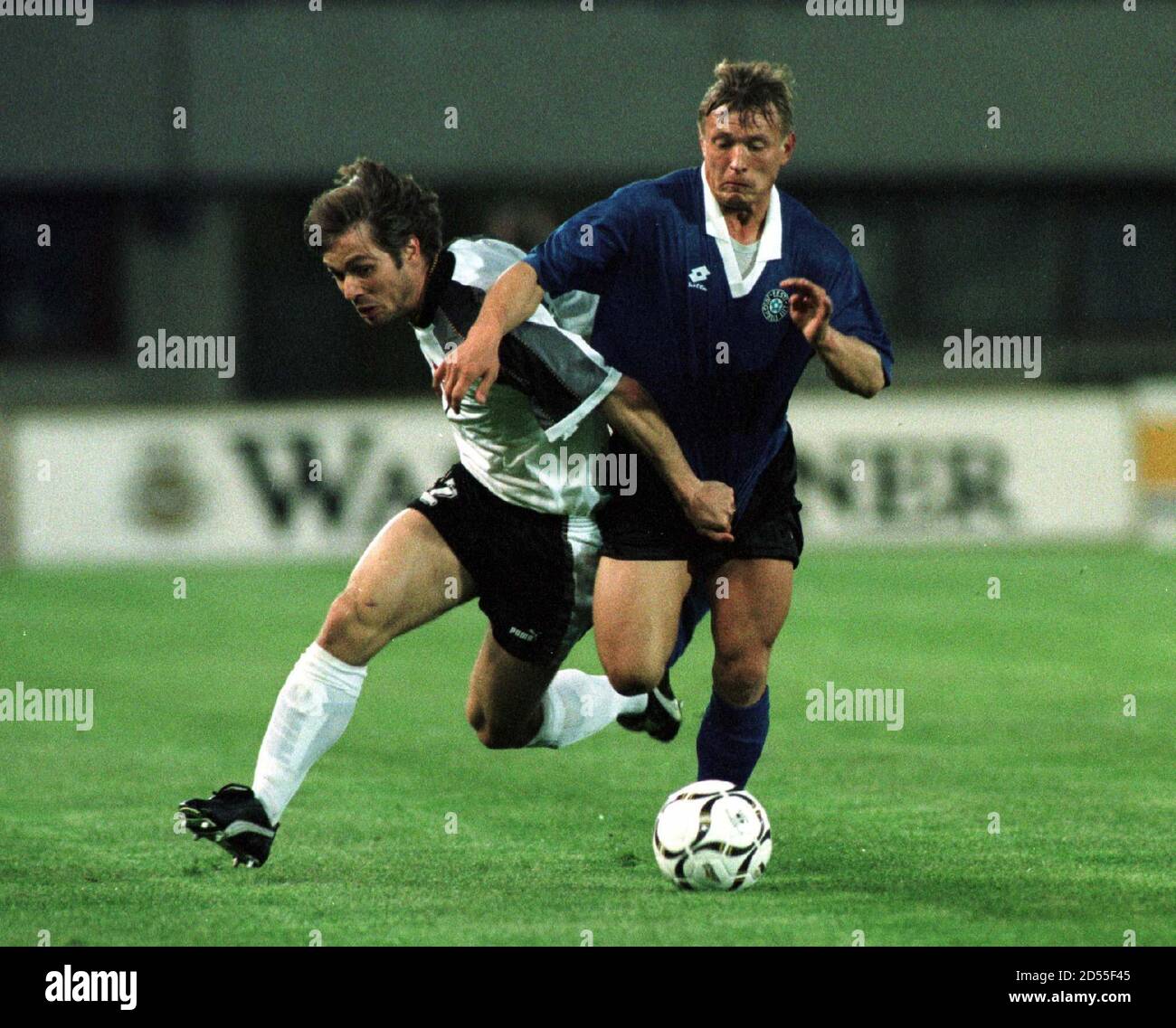 Austria's Harald Cerny (L) and Estonia's Viktor Alonen fight for the ball during their soccer world championship qualifying match, April 30.  SPORT SOCCER Stock Photo