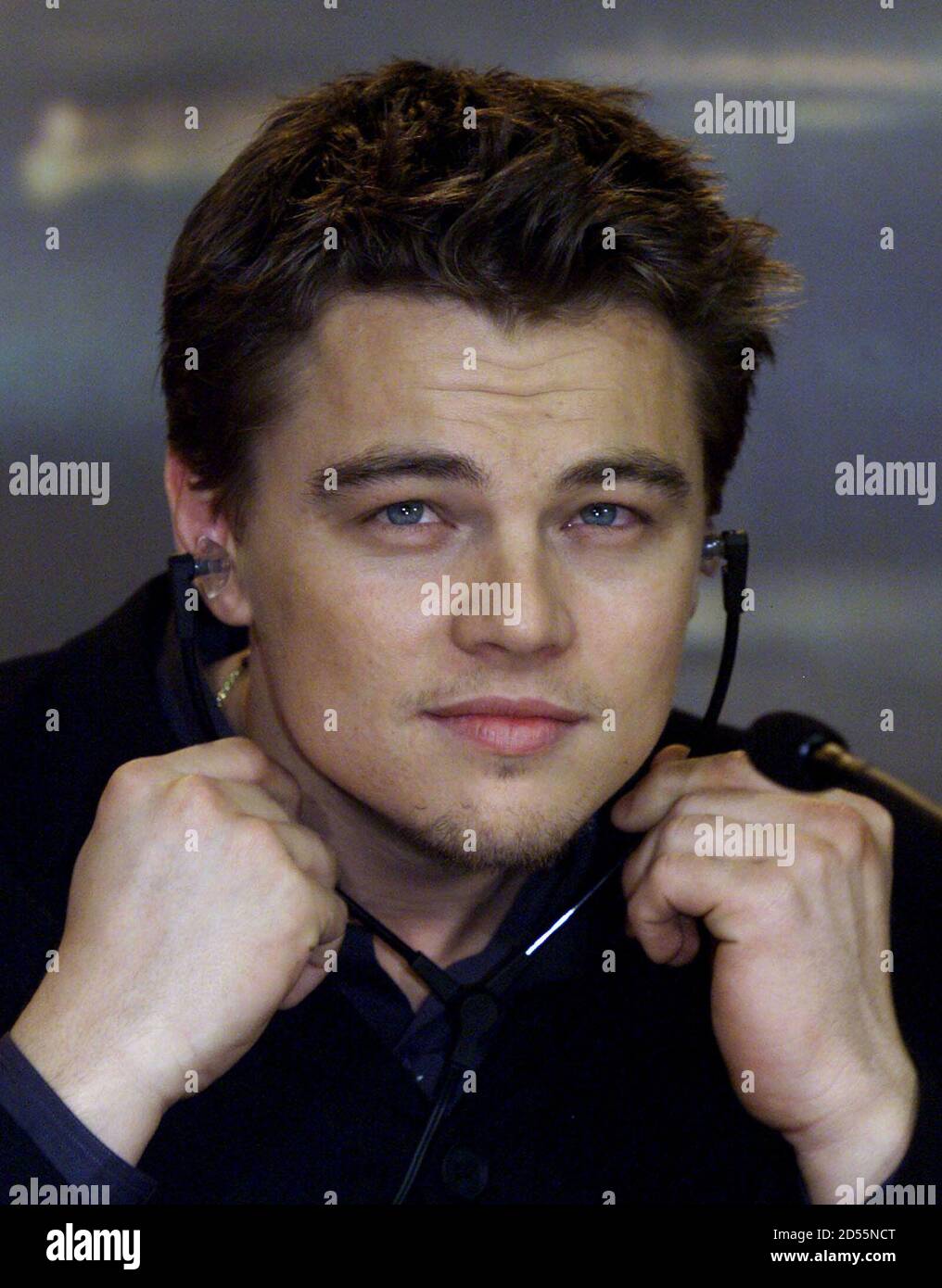 U S Actor Leonardo Dicaprio Adjusts His Earphones As He Addresses A News Conference To Introduce His New Film The Beach At The International Film Festival Berlinale In Berlin February 12 The Film Which