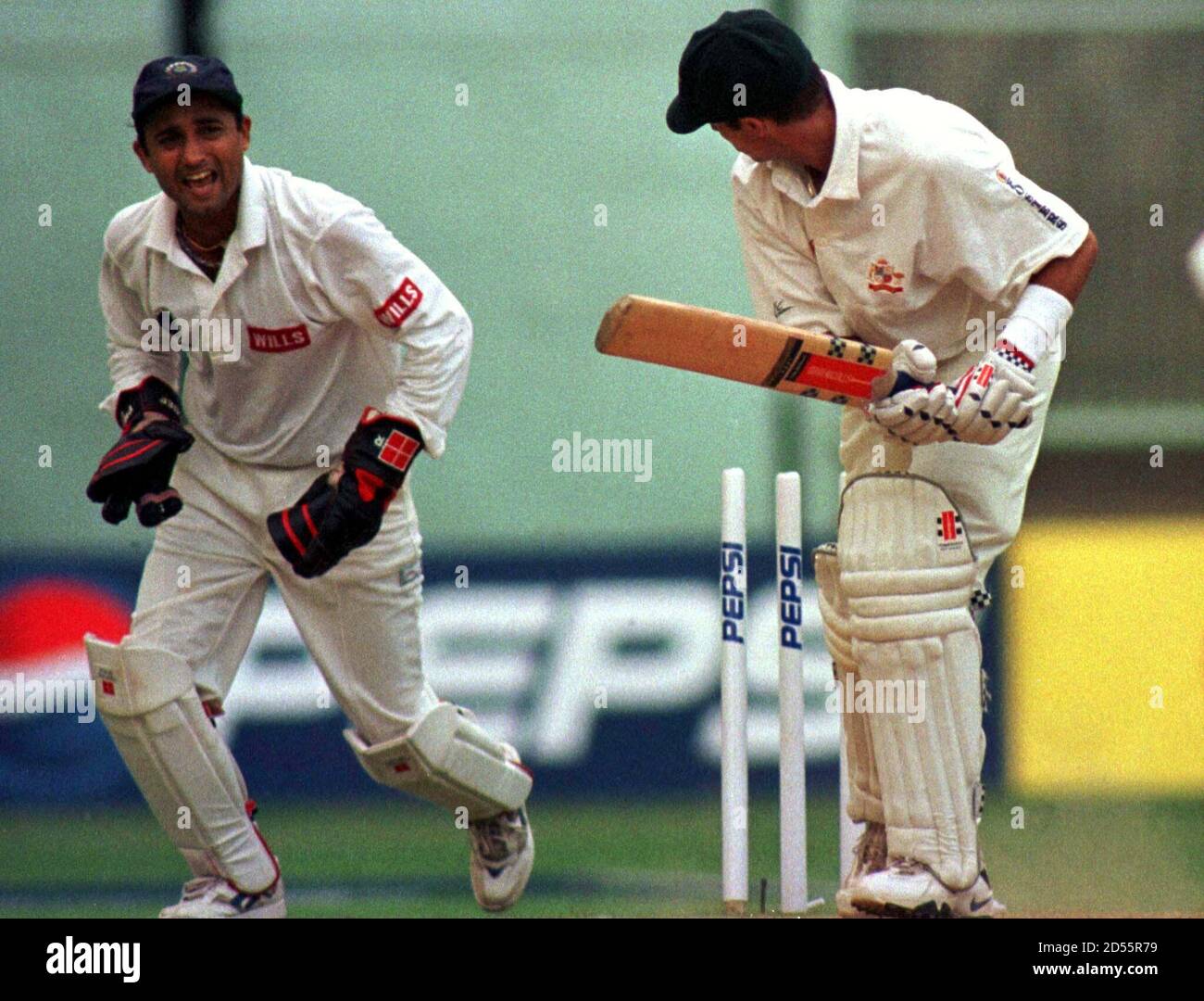 Indian Wicket Keeper Nayan Mongia L Celebrates The Dismissal Of The Australian Batsman Gregory Blewett In The Second Day S Play Of The Third And Final Test Match Between The Two Countries In