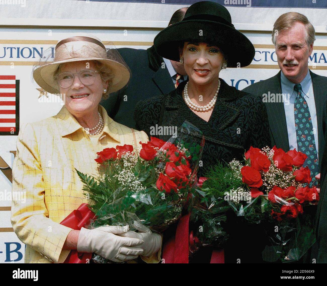 The Lady Mary Churchill Soames (L), the last surviving child of Winston S. Churchill, poses with Janet Langhart Cohen, wife of U. S. Secretary of Defense William Cohen, before the launching of the Winston S. Churchill, an Arleigh Burke Class Aegis guided missile destroyer, at Bath Iron Works in Bath, April 17. Maine Governor Angus King look on at rear, right.  HB/RC Stock Photo