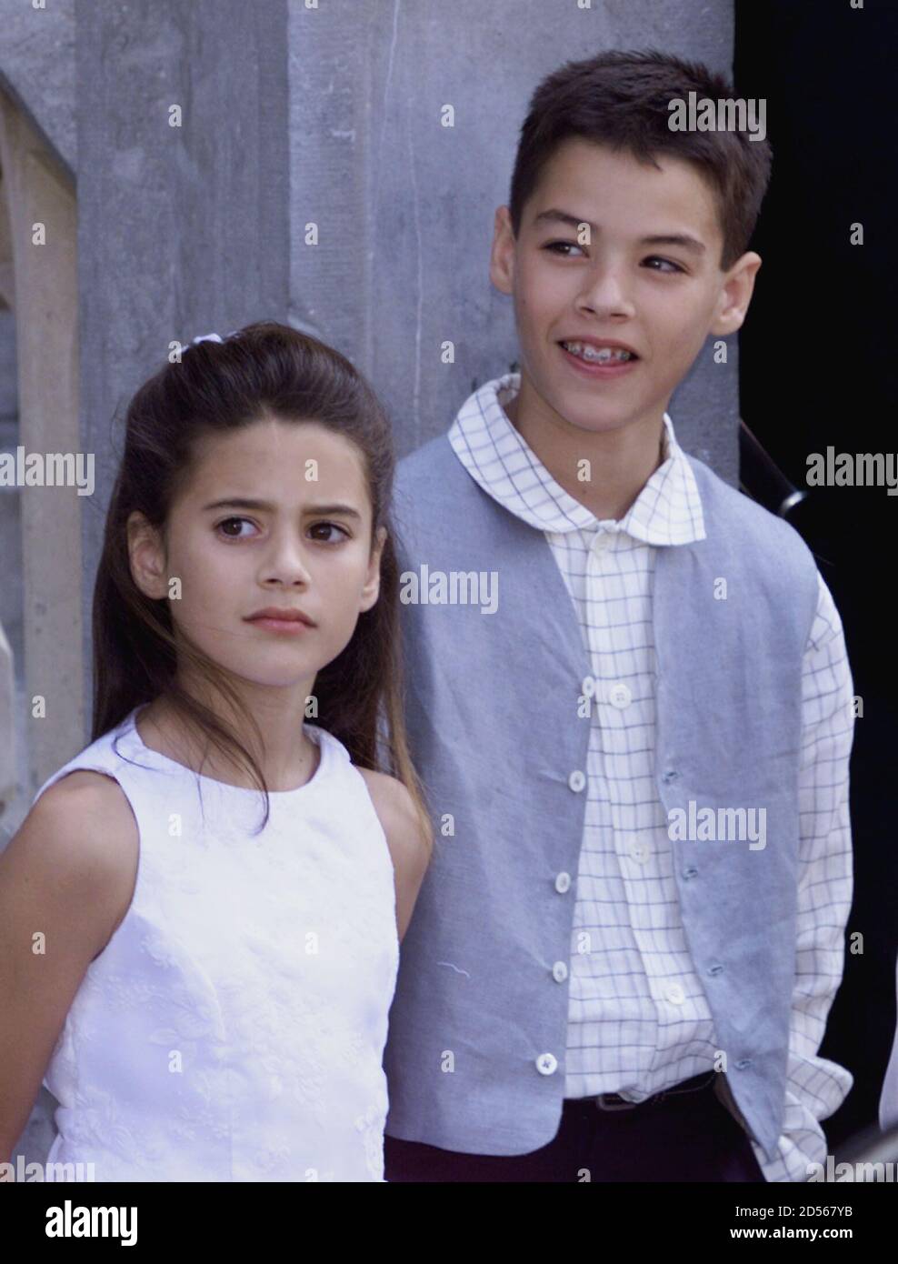 Bianca (L), 8, and Kristopher (R), 13, the children of Belgian-born  Hollywood star Jean-Claude Van Damme and American Gladys Portugues wait  outside the townhall of the Belgian seaside resort of Knokke-Heist,  northwestern