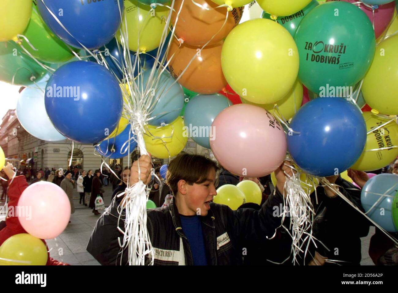 Activist Of The Croatian Non Government Human Rights Coalition Glas 99 Hands Out Balloons Urging Citizens To Vote At Zagreb S Main Square On December 29 Parliamentary Elections Will Take Place In Croatia On