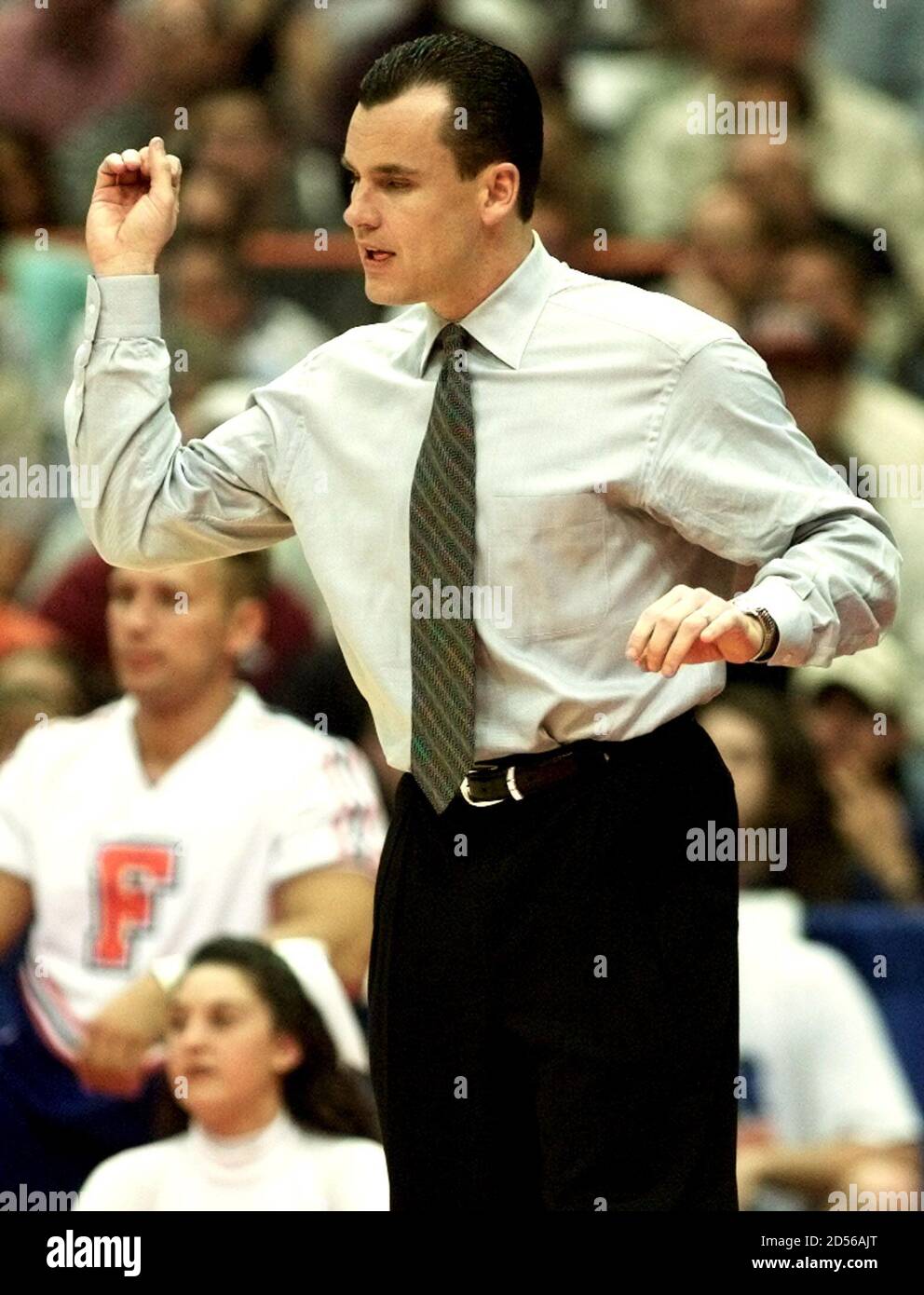 University of Florida Gators head coach Billy Donovan directs his team from the sidelines as they play the Duke University Blue Devils, in Syracuse March 24. The Gators are playing the Blue University of Florida Gators head coach Billy Donovan directs his team from the sidelines as they play the Duke University Blue Devils, in Syracuse March 24. The Gators are playing the Blue