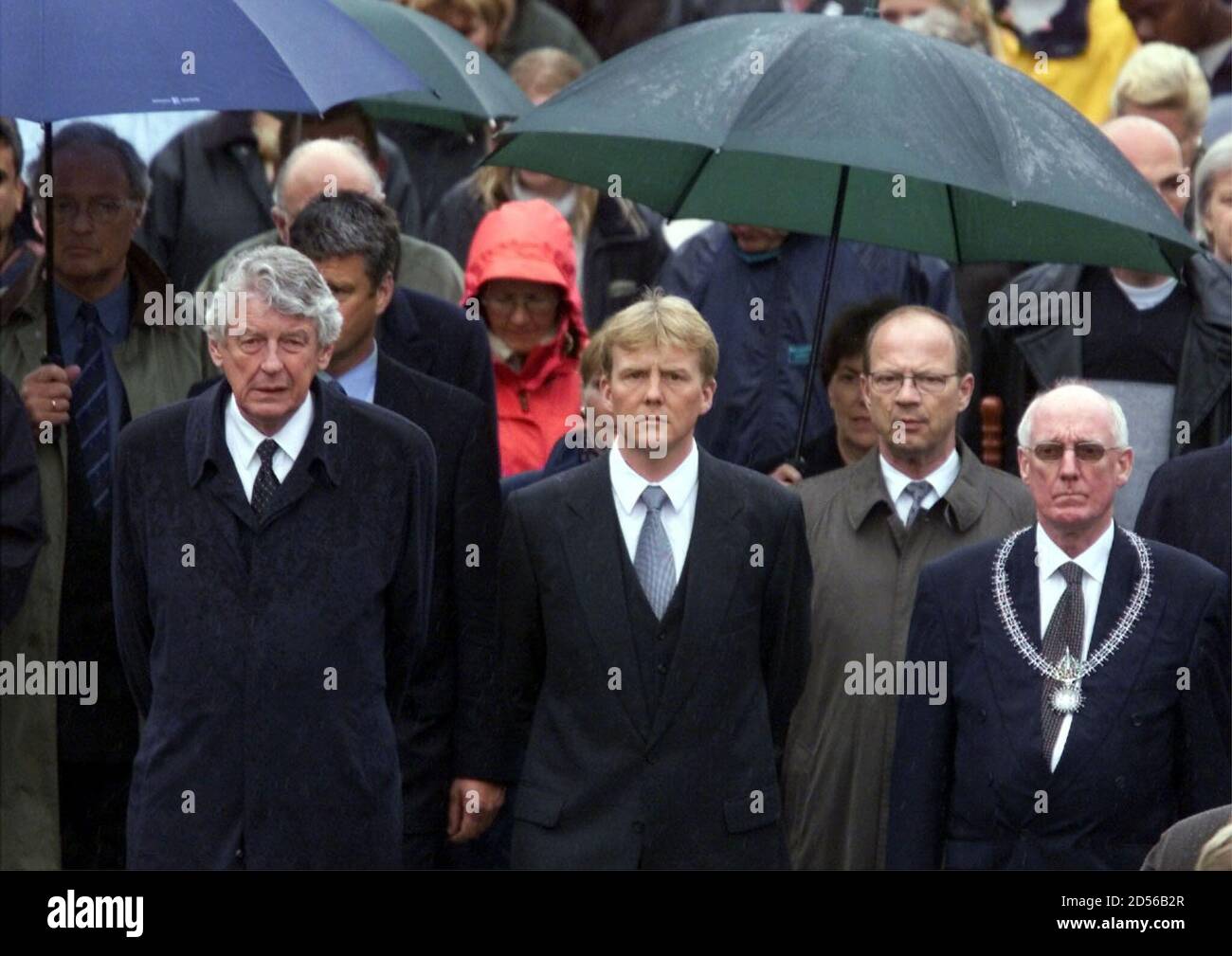 Dutch Prime Minister Wim Kok L Crown Prince Willem Alexander C And Enschede Mayor Jan Mans R Attend A Commemerative March Of Compassion For The Victims Of The Fire Works Explosion In