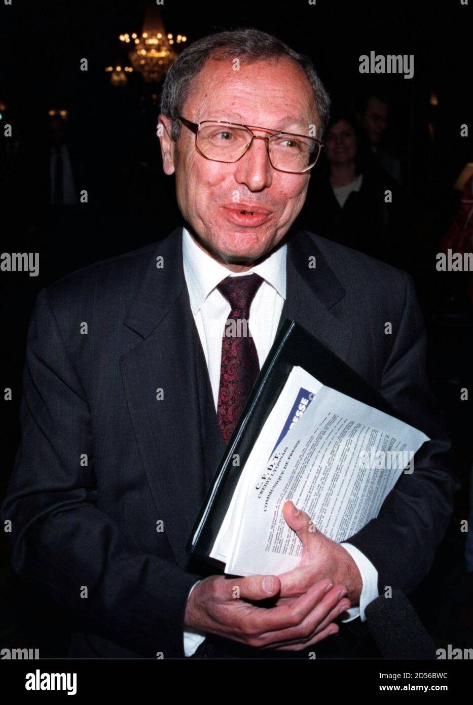 Credit Lyonnais chairman Jean Peyrelevade holds documents as he arrives at  a press conference, March 20. The French state-controlled bank, which lost  21 billion francs between 1992 and 1994, reports a 202