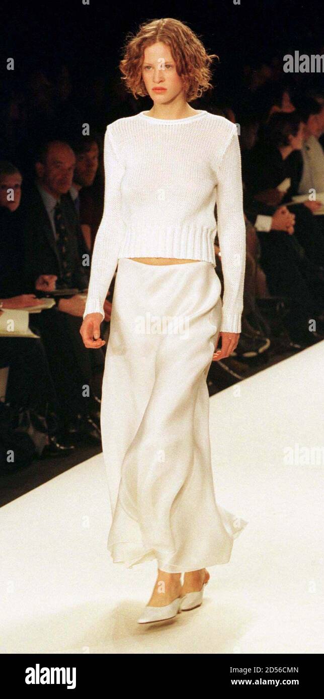 A model for designer Ralph Lauren wears sweater and silk skirt during a  showing of the designer's Spring 1999 fashion collection in New York,  November 4. The Spring 1999 collections are showing