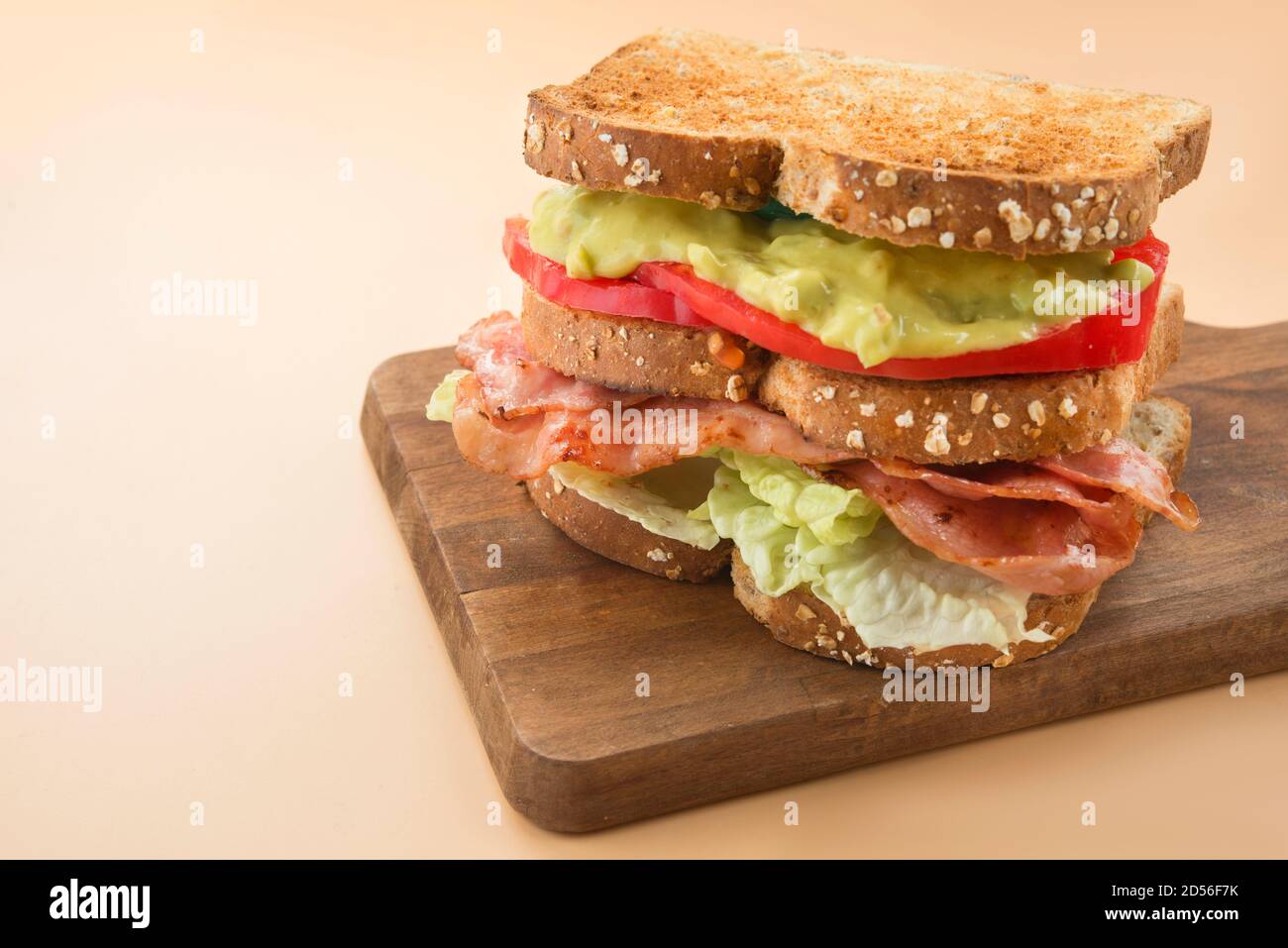 Sandwich LGBT lettuce, guacamole, bacon and tomato Stock Photo Alamy