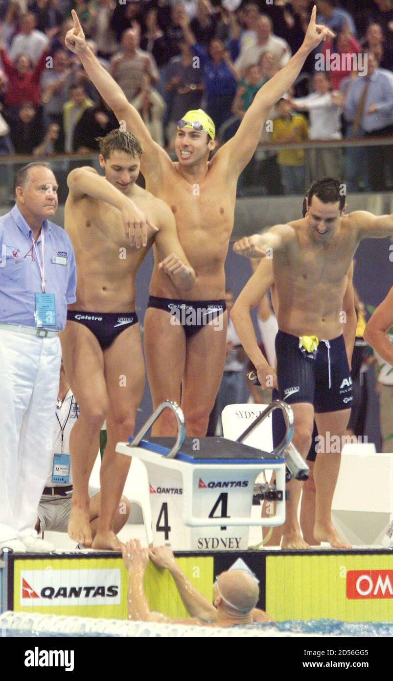 AUSTRALIA'S 4X200 METRE FREESTYLE RELAY TEAM CELEBRATE WINNING FINAL AT THE  PAN PACIFIC SWIMMING CHAMPIONSHIPS IN SYDNEY. Australia's Ian Thorpe (L-R),  Grant Hackett, William Kirby celebrate team-mate Michael Klim touching the  wall